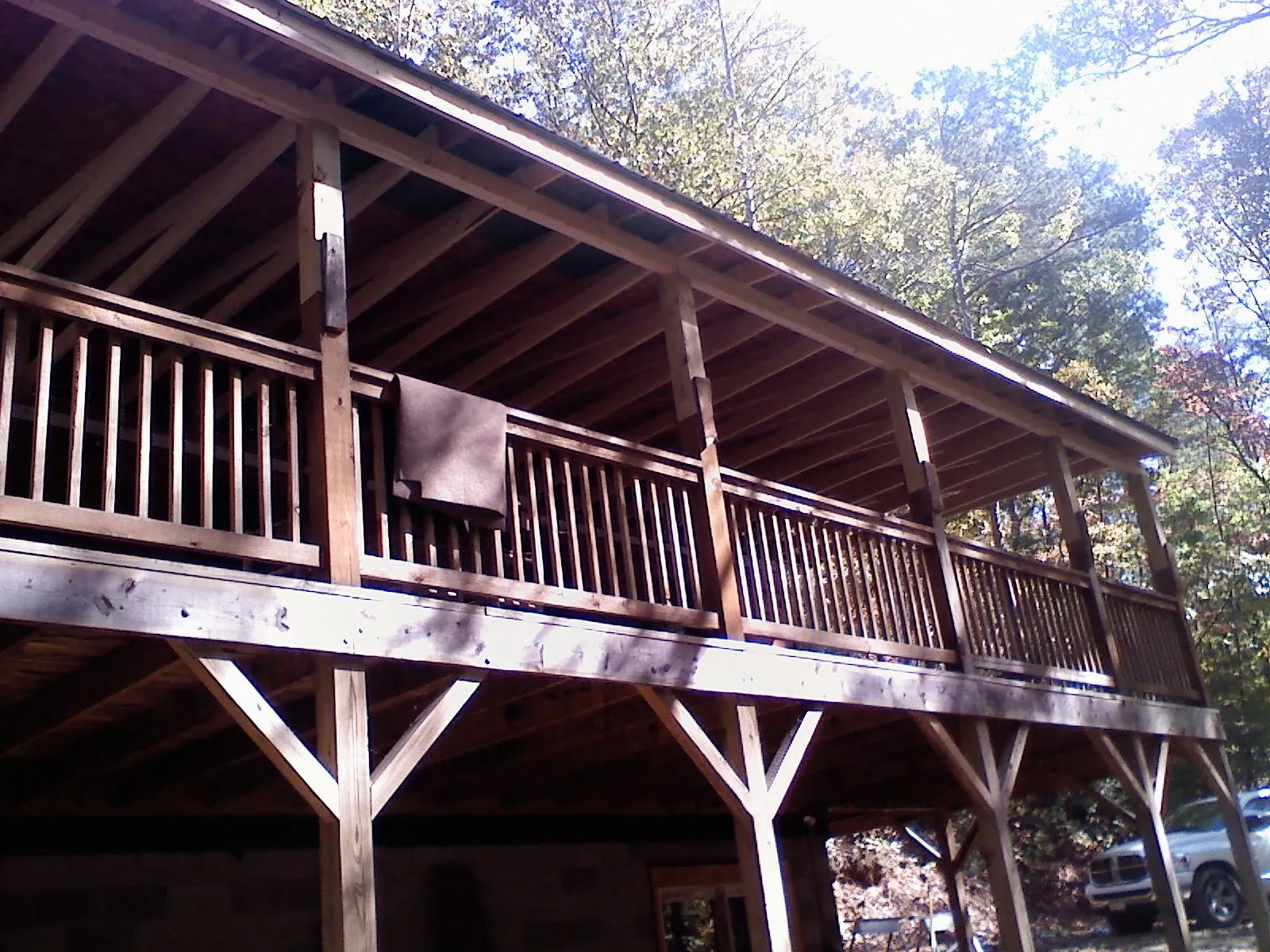 Timber framing under a new elevated porch and deck — Roof Leak Repair in Big Piney by Roofing Brothers